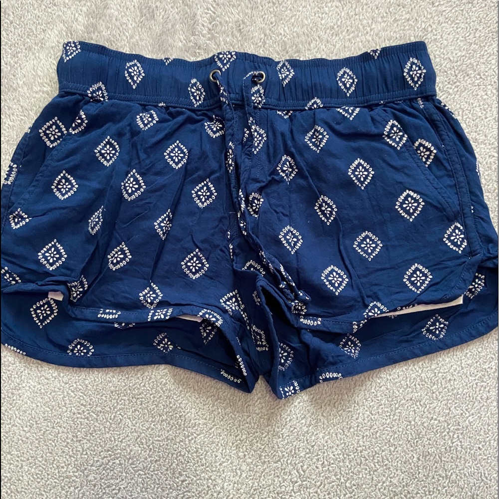 blue and white diamond pattern booty shorts